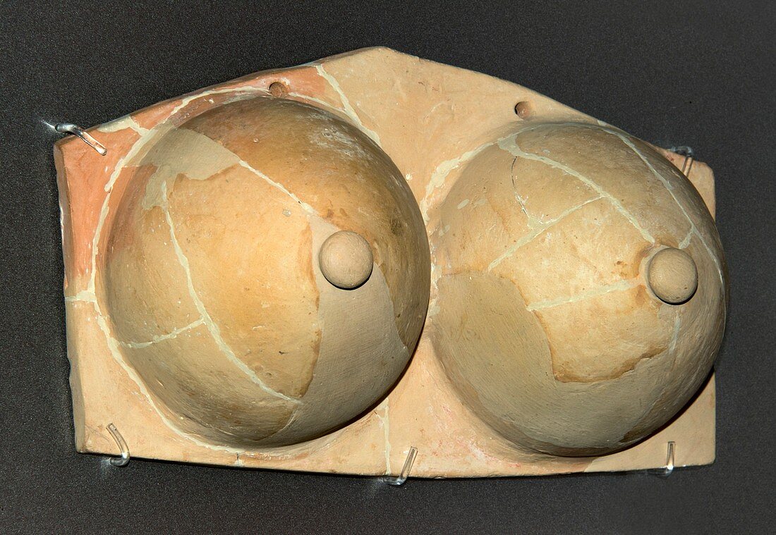 Ancient Greek breasts votive sculpture.