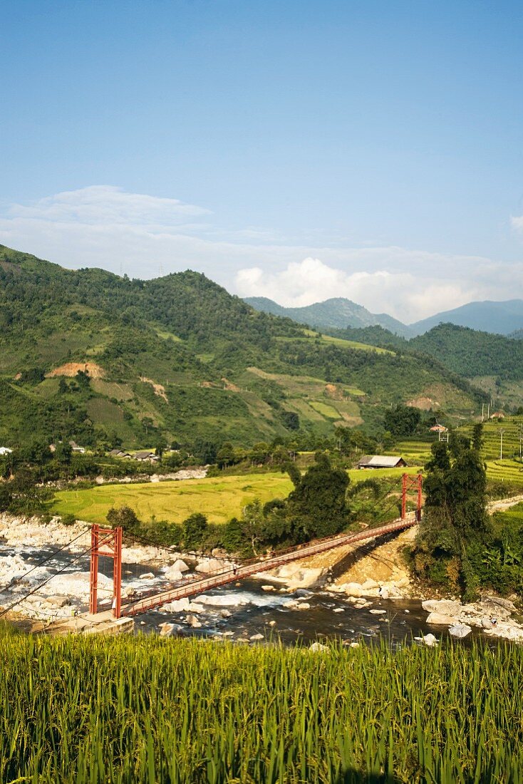 Suspension bridge in the mountains near Ban Ho, Vietnam