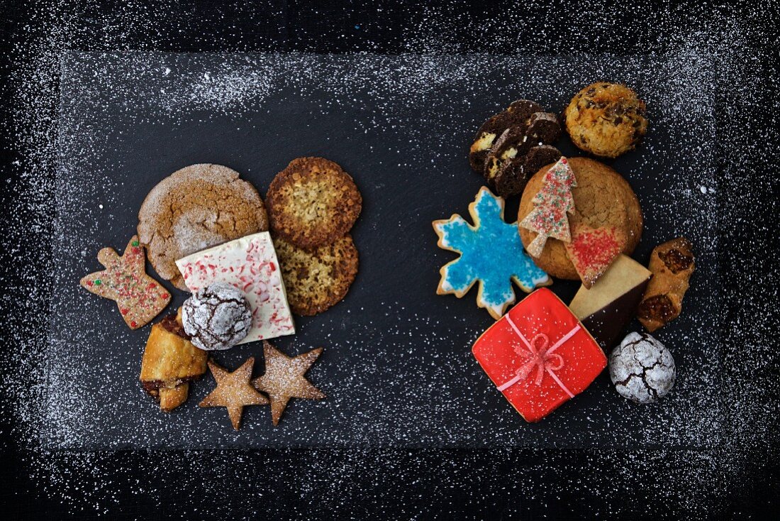Various Christmas cookies on a dark background