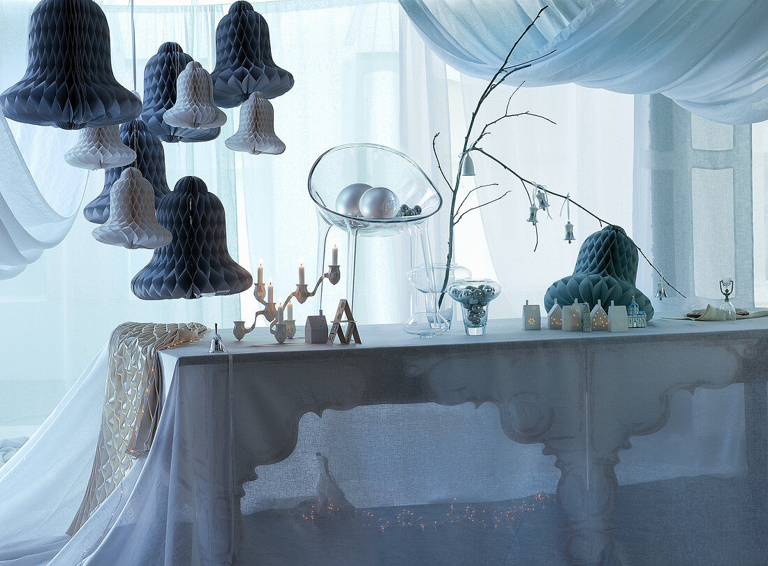 White Christmas decorations on long dining table