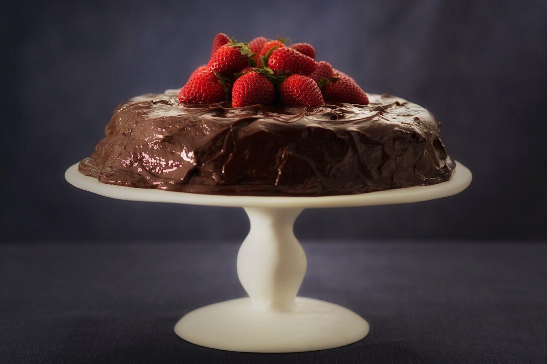 Chocolate cake with a fresh strawberry top