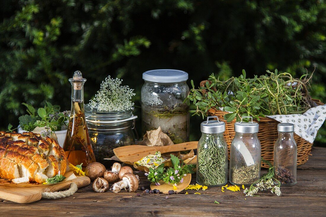 Various wild herbs (fresh, dried and in jars), mushrooms, herb butter and pull apart bread