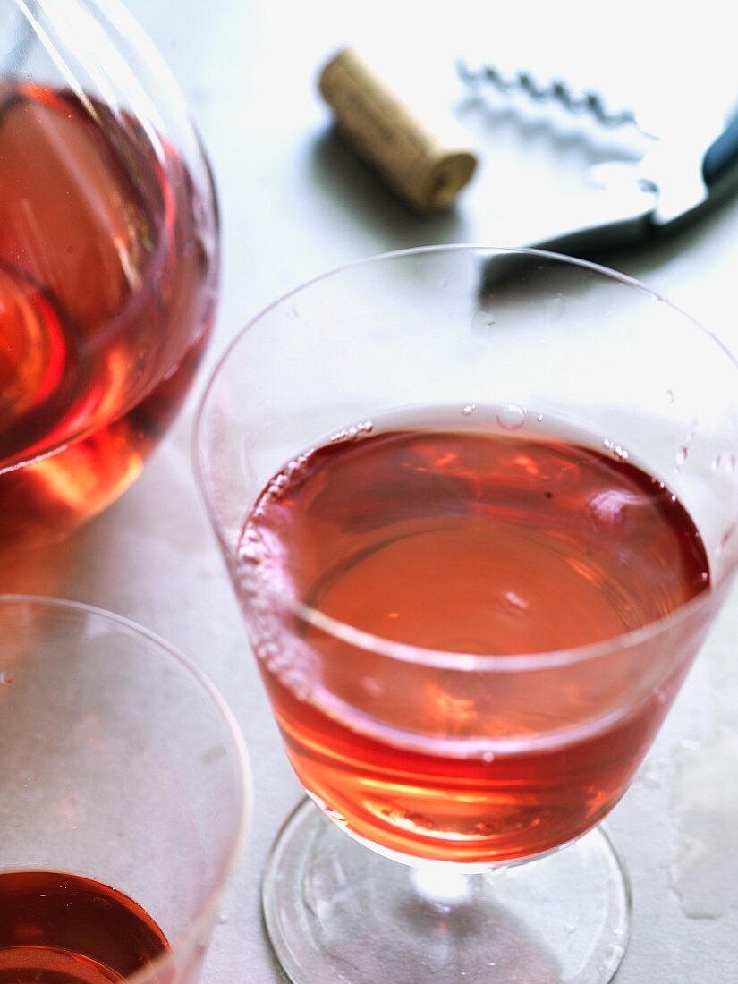 A glass of cold rosé wine