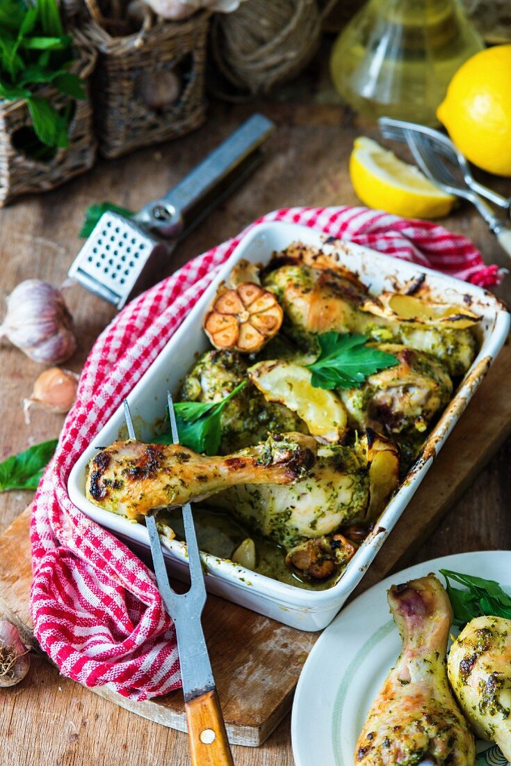 Chicken legs roasted in parsley, lemon and garilc
