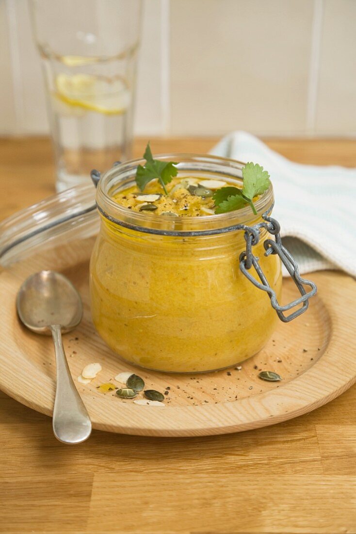 Spicy lentil soup in a glass jar