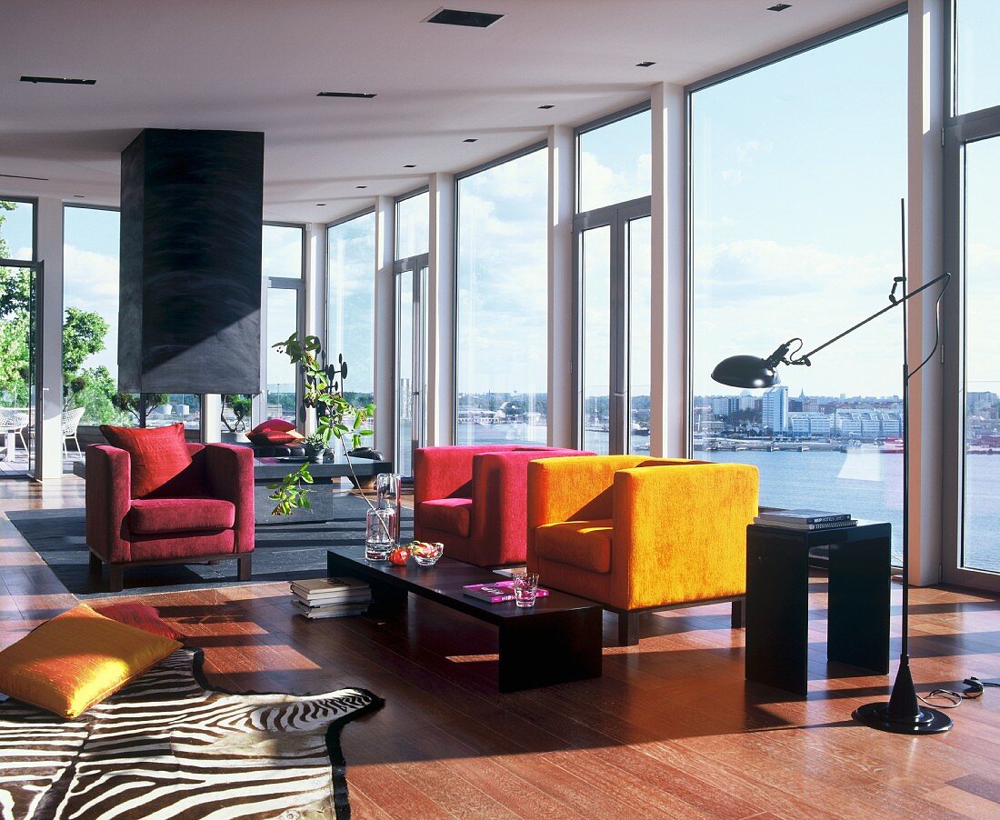 Lounge with glass walls and view of lake
