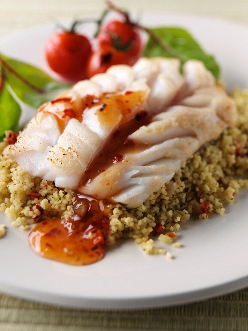 Steamed cod with sweet chili sauce and couscous