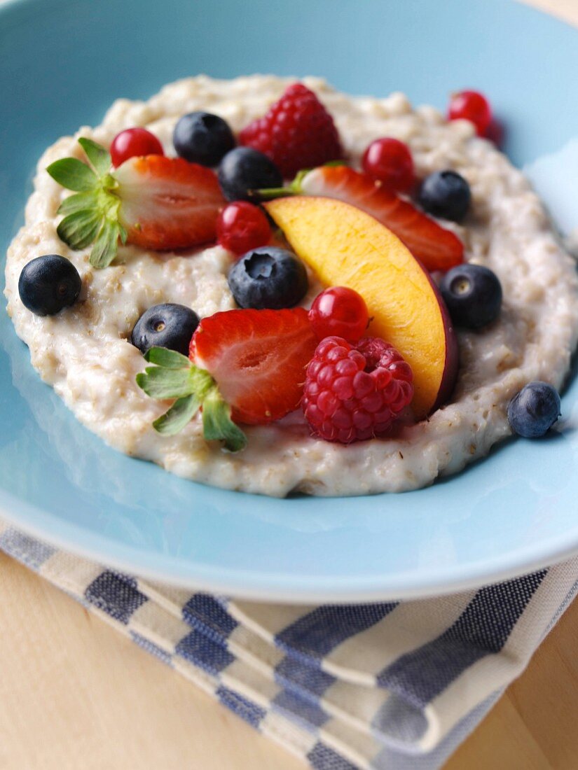 A bowl of porridge and fruit