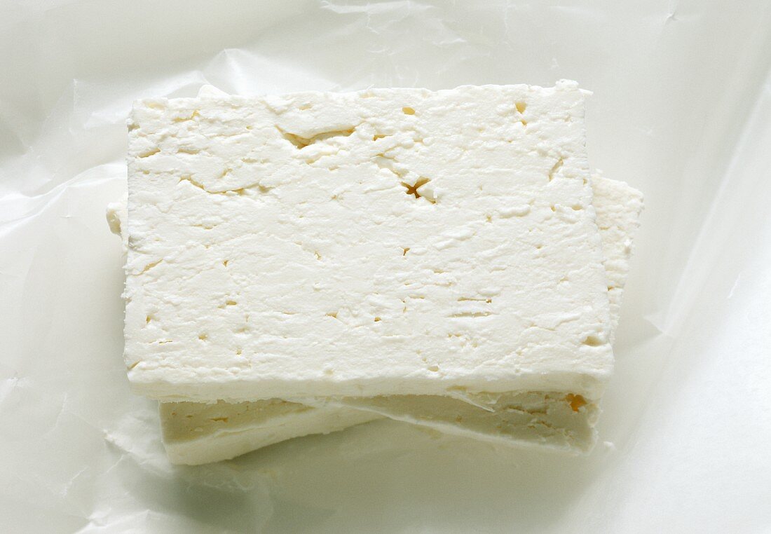 Slices of Feta Cheese on Paper