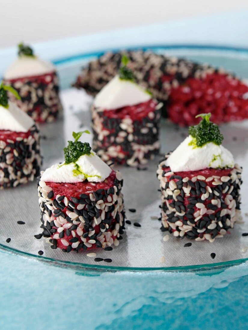 Beetroot rissotto cakes with goats cheese and salsa verde