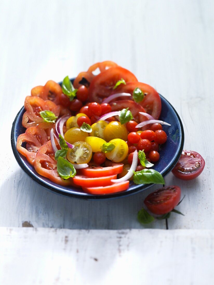 Tomato salad made using different sized tomatoes