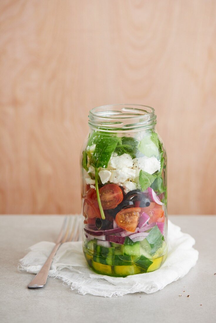 Greek salad in a glass jar