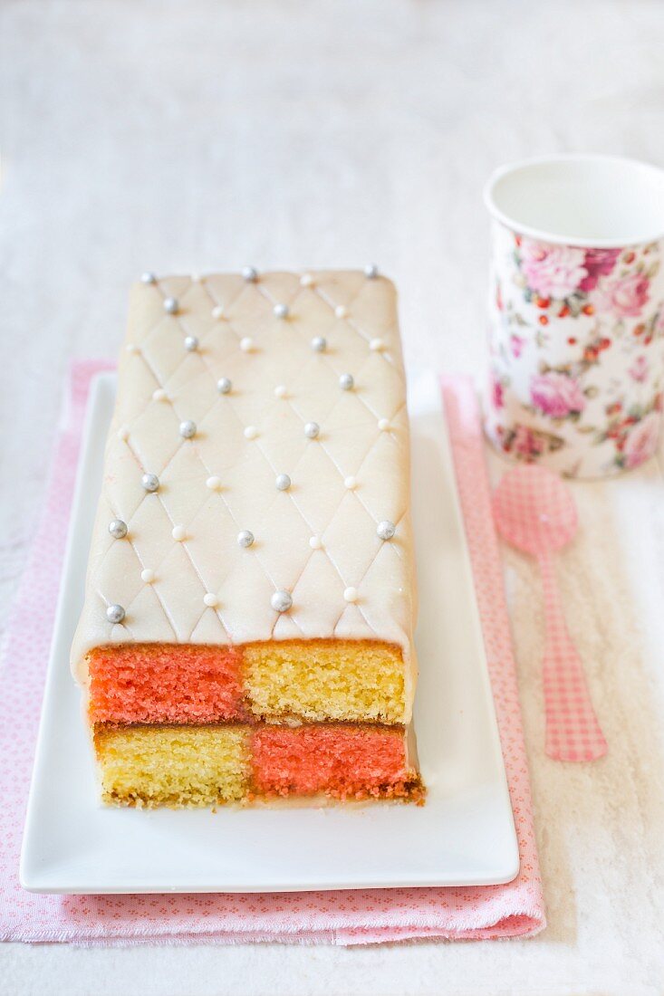 Battenberg cake with marzipan and edible silver beads