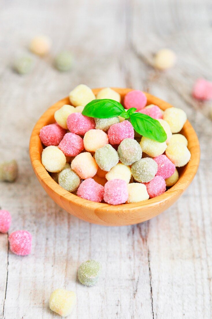 Small colourful gnocchi with basil leaves