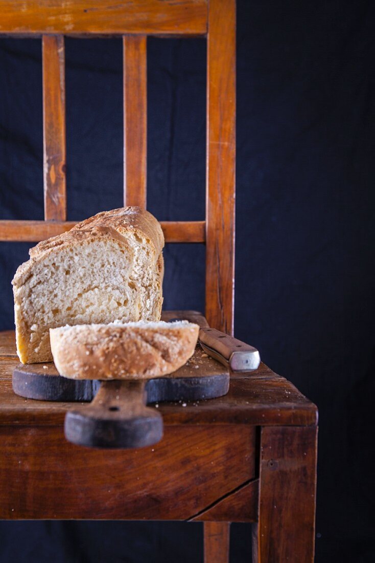 Coconut toast bread, sliced, on a chopping board