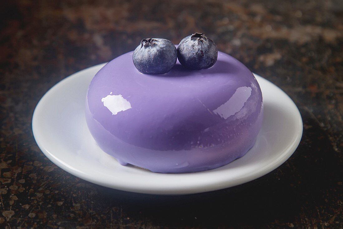 Vanilla Bean Cake Donuts with Blueberry Glaze - The Sweetest Occasion