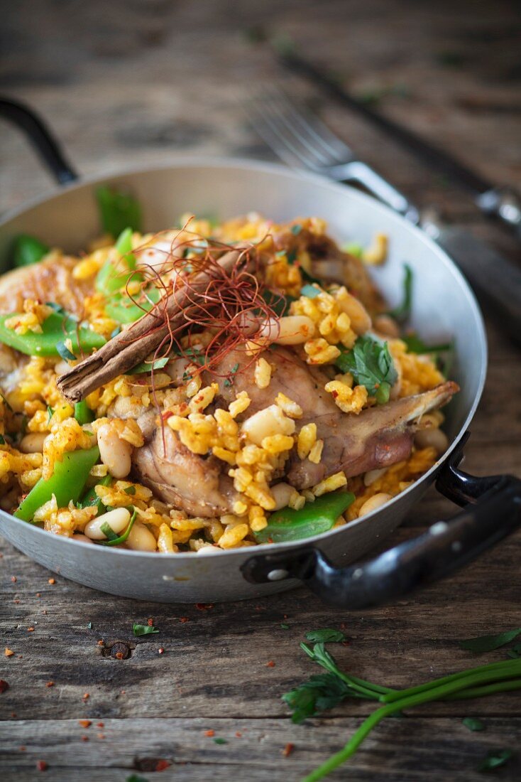 Paella Valenciana in a pan