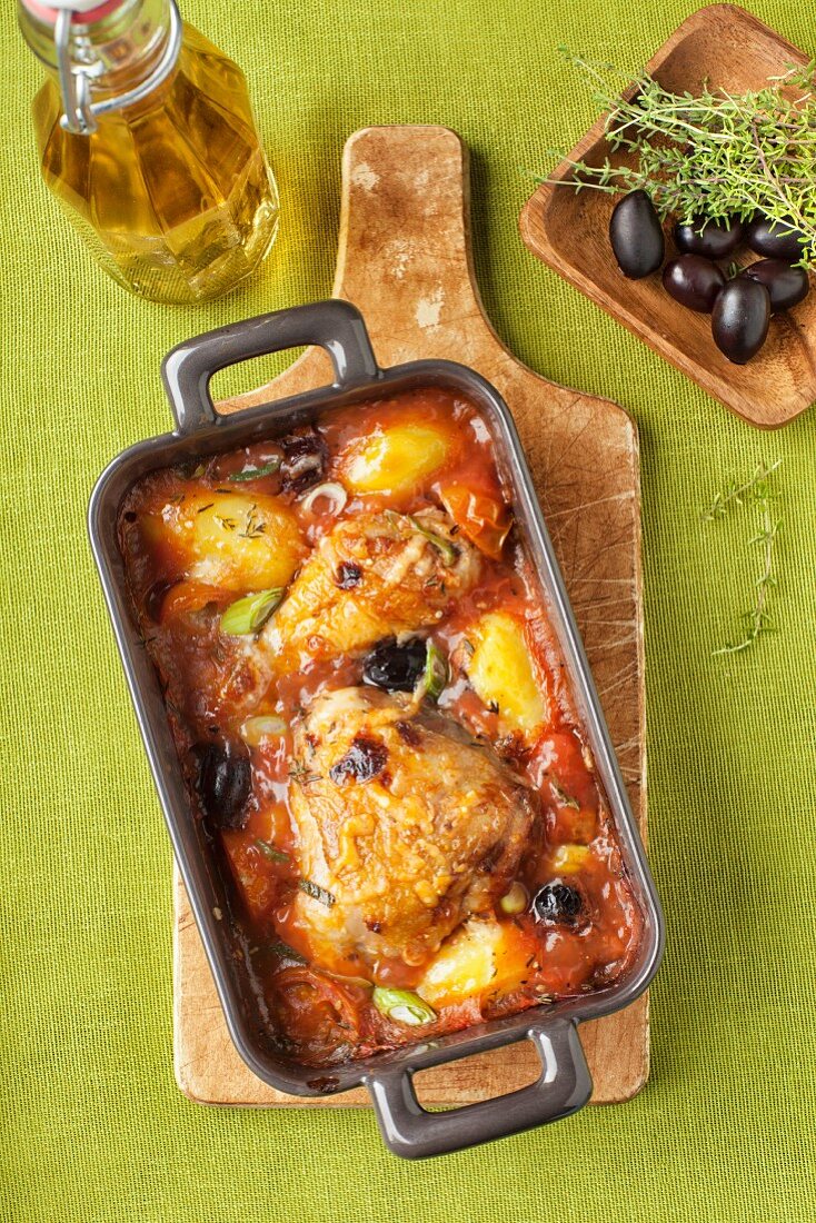 Chicken in white wine and tomato sauce with potatoes