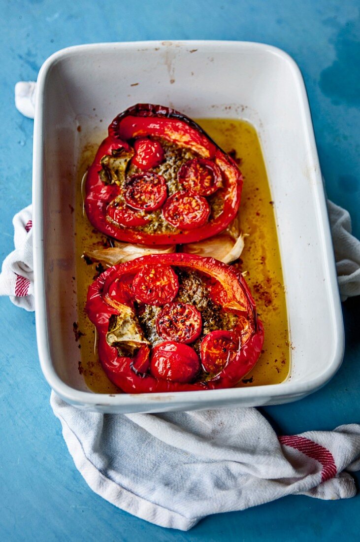 Stuffed peppers with cherry tomatoes, anchovies and garlic