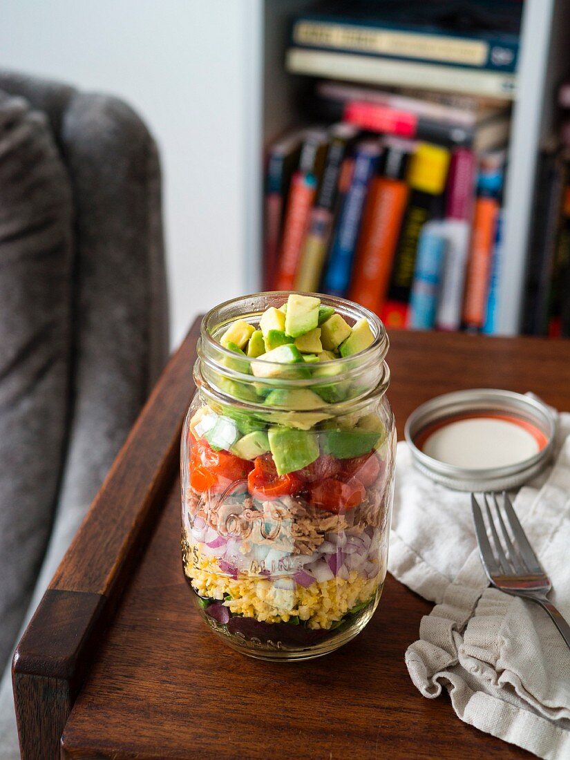 Layered salad with tuna, cauliflower and rice in a jar