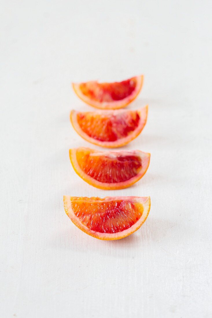 Blood orange slices in a row