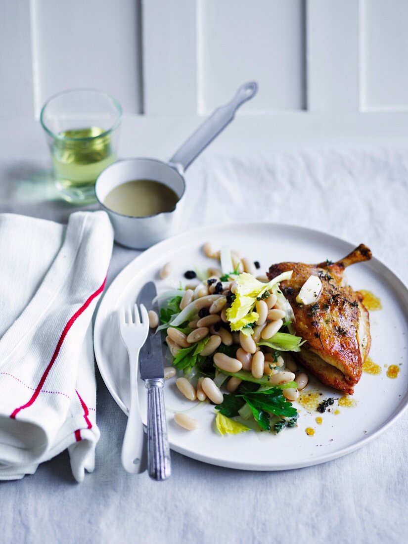 Roast chicken with celery, anchovy and white bean salad