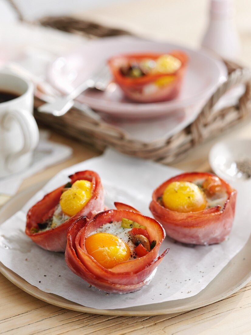 Fried ham nests with fried eggs for breakfast