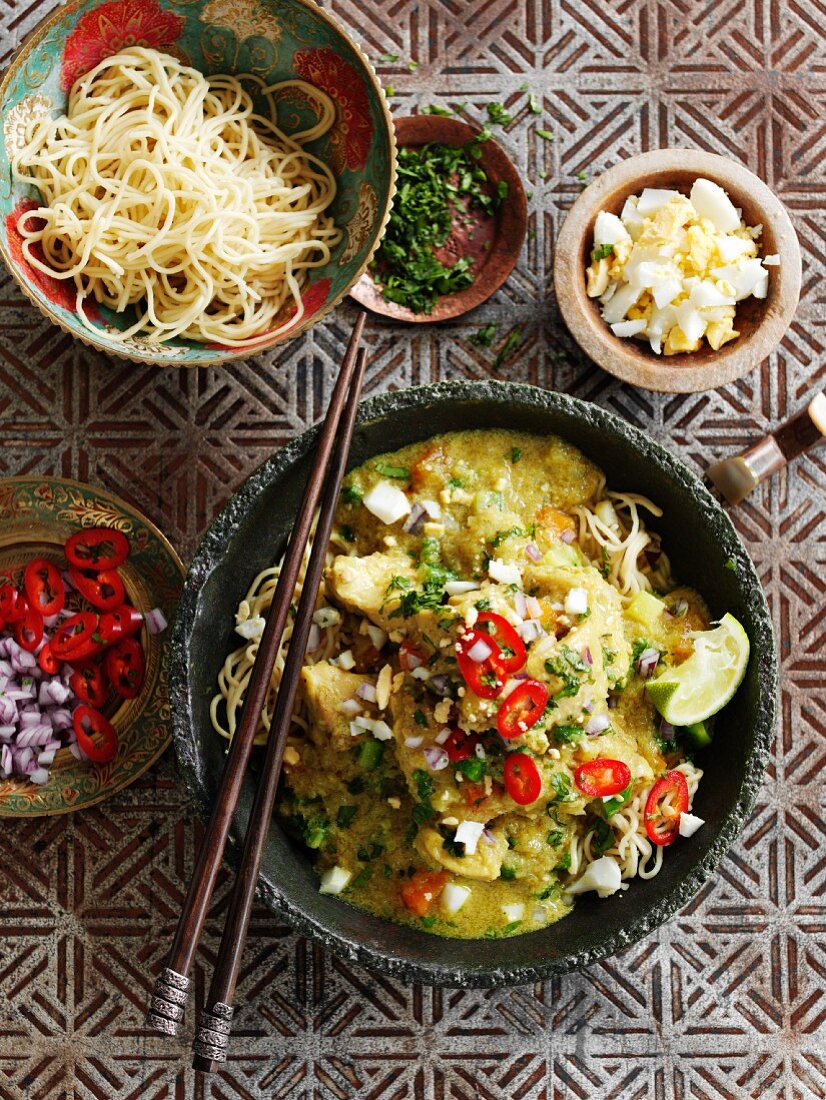 Chicken and coconut curry with chilli, egg and noodles (Burma)
