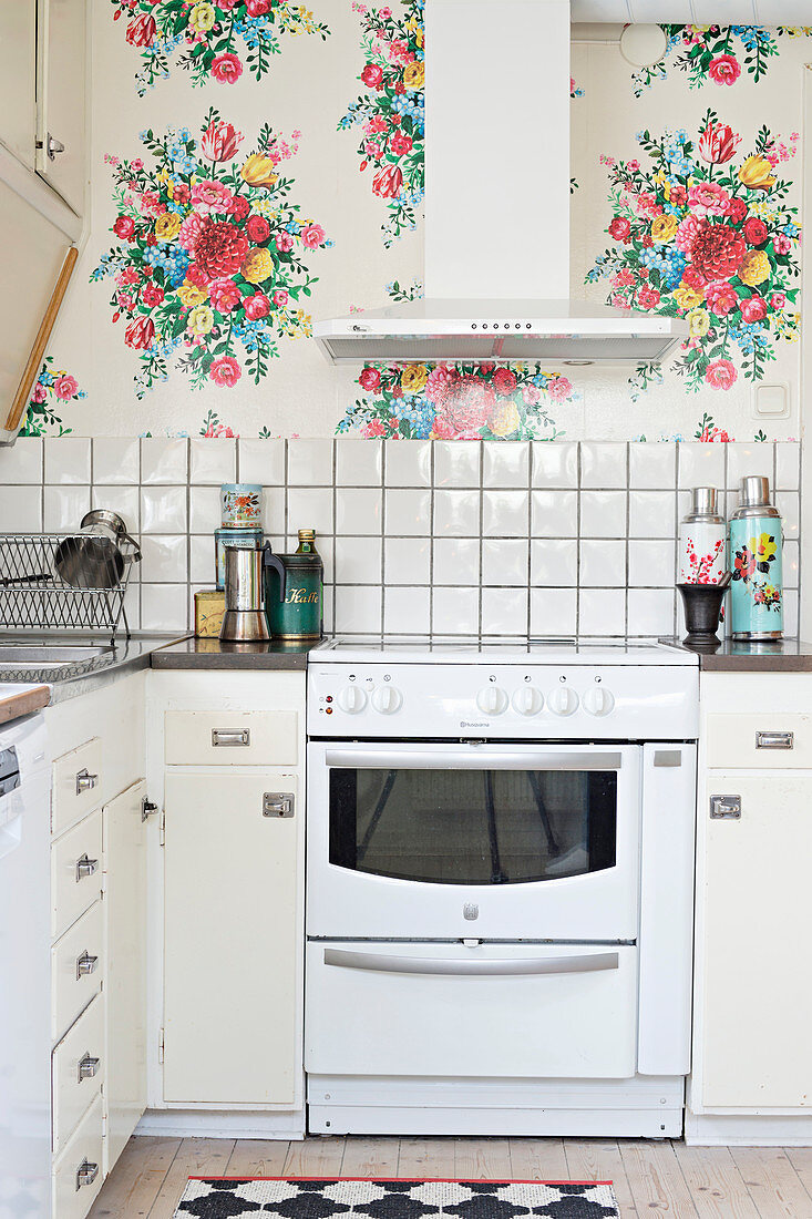 Old kitchen with floral wallpaper