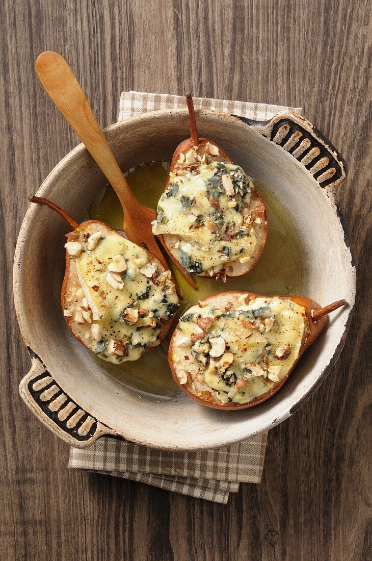Grilled pears topped with blue cheese and nuts