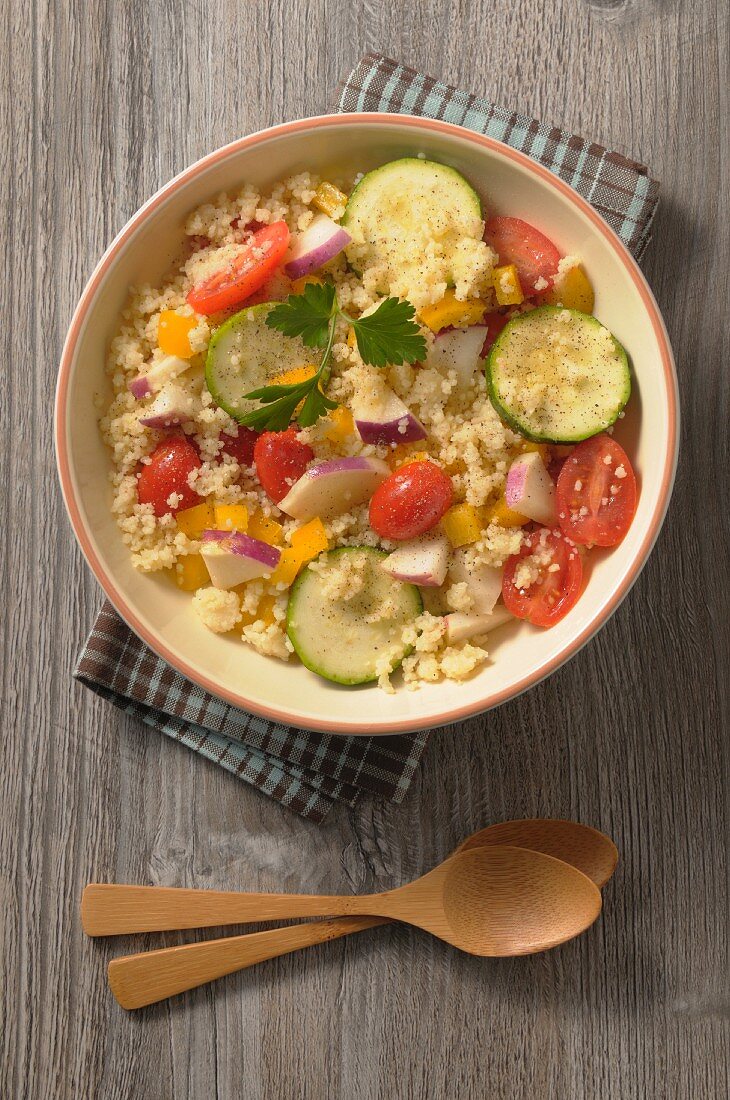 Couscous with zucchini, tomatoes, peppers and navette