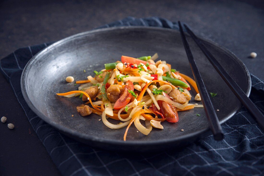 Vegan Som Tam (Thai papaya salad) with soya strips