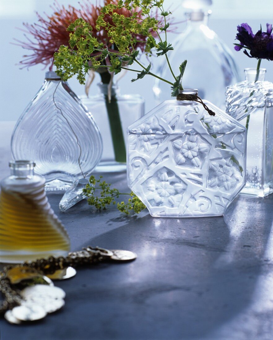 Old perfume bottles used as vases