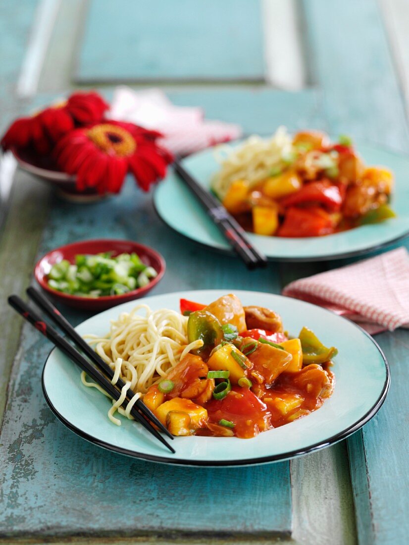 Sweet and sour chicken with noodles (China)