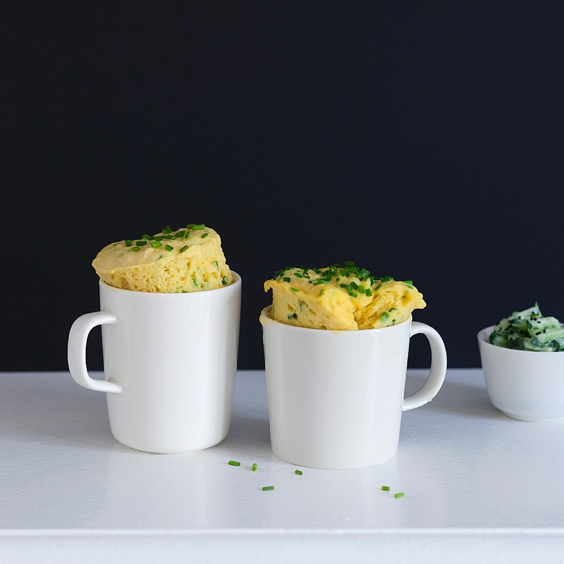 Savoury mug cakes with cheddar and chives