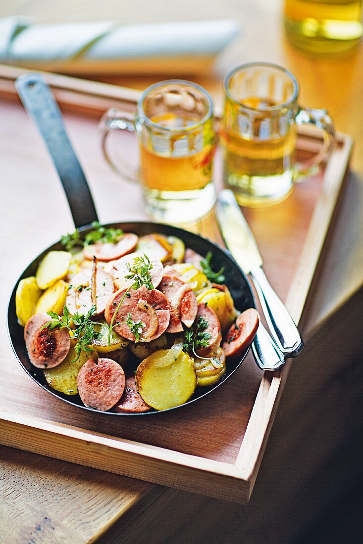 A pan with Lyoner sausage and fried potatoes served at the 'Saarschleife' hotel in the Saarland region of Germany