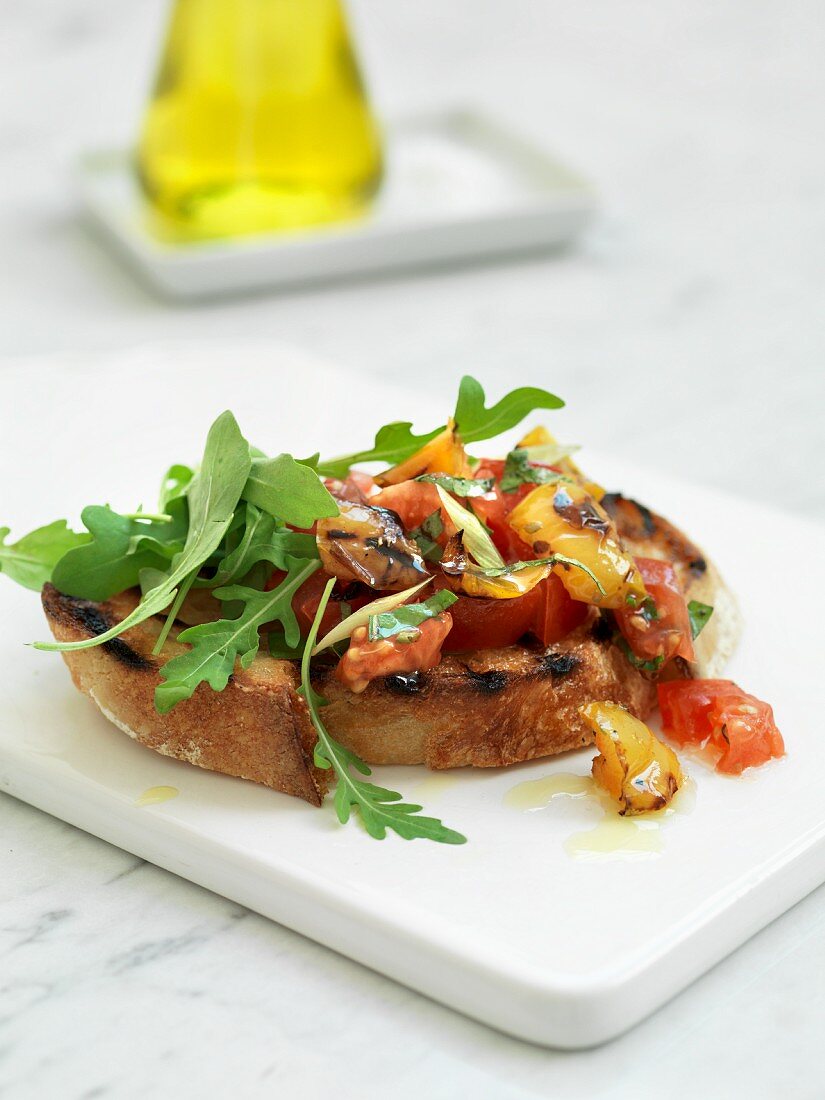 Bruschetta with tomatoes and rocket