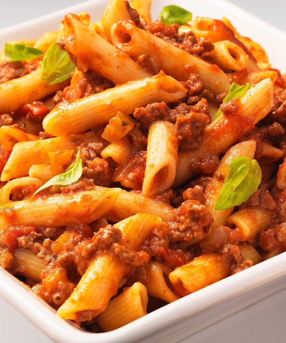 Penne Bolognese with basil