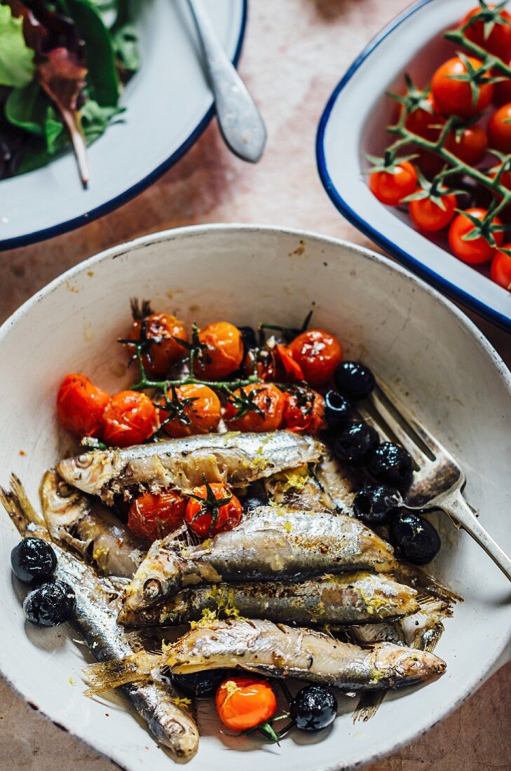 Sprats with olives and cocktail tomatoes