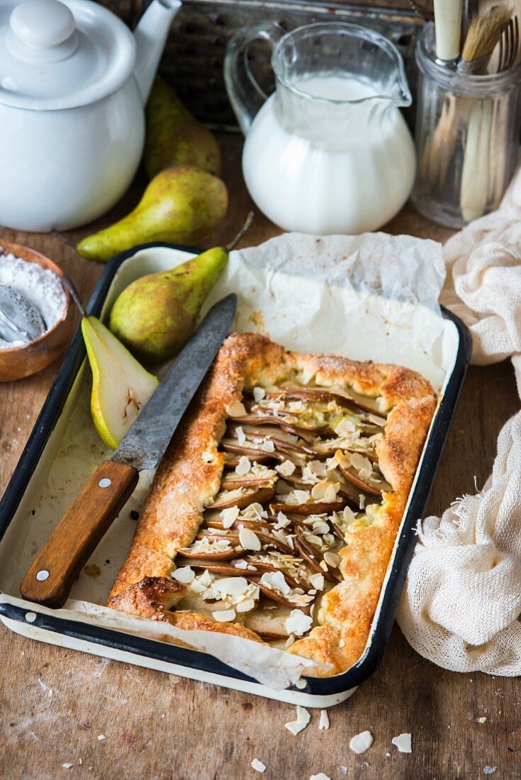 A pear pie with flaked almonds