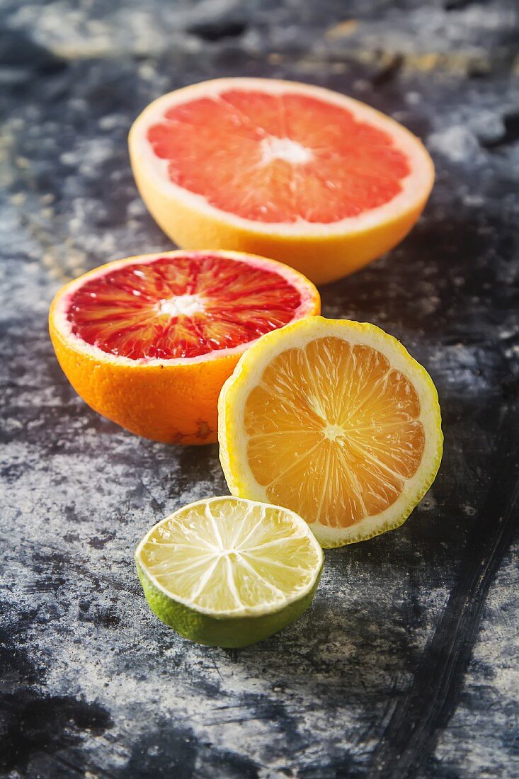 Assorted citrus fruit, halved
