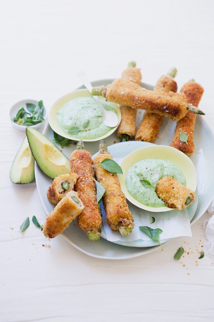 French toast roll-ups with ham, asparagus and avocado and rocket dip