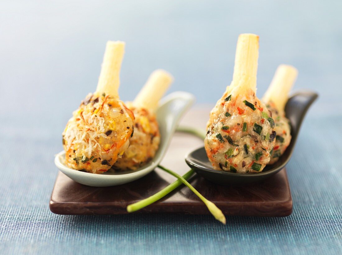 Prawn lollipops with cheese and herbs