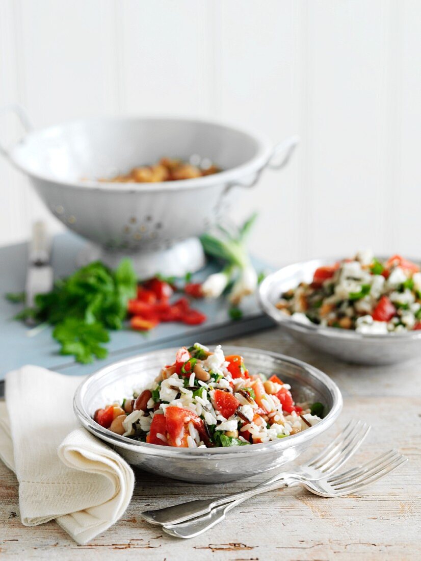 Wild rice salad with beans, tomatoes and herbs