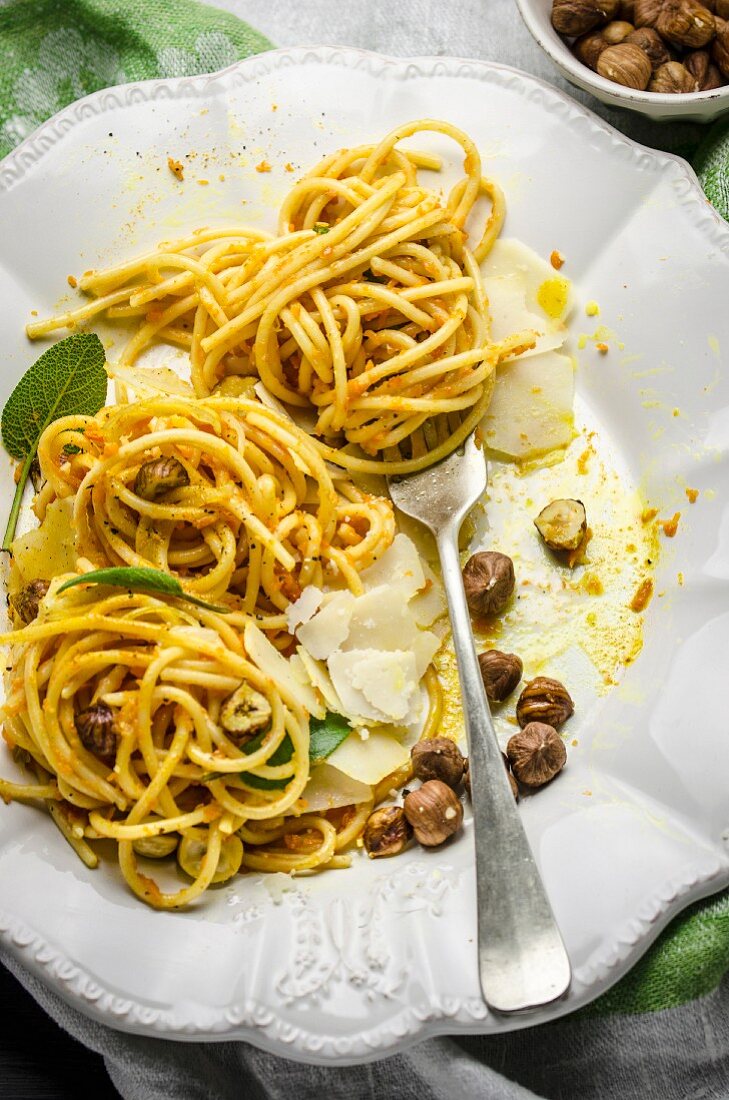 Pumpkin spaghetti carbonara with sage and roasted hazelnuts