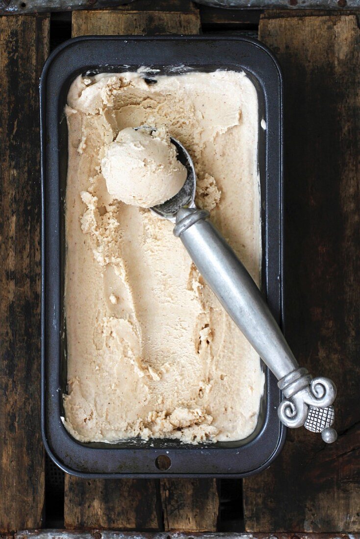 Spiced chai ice cream with a scoop