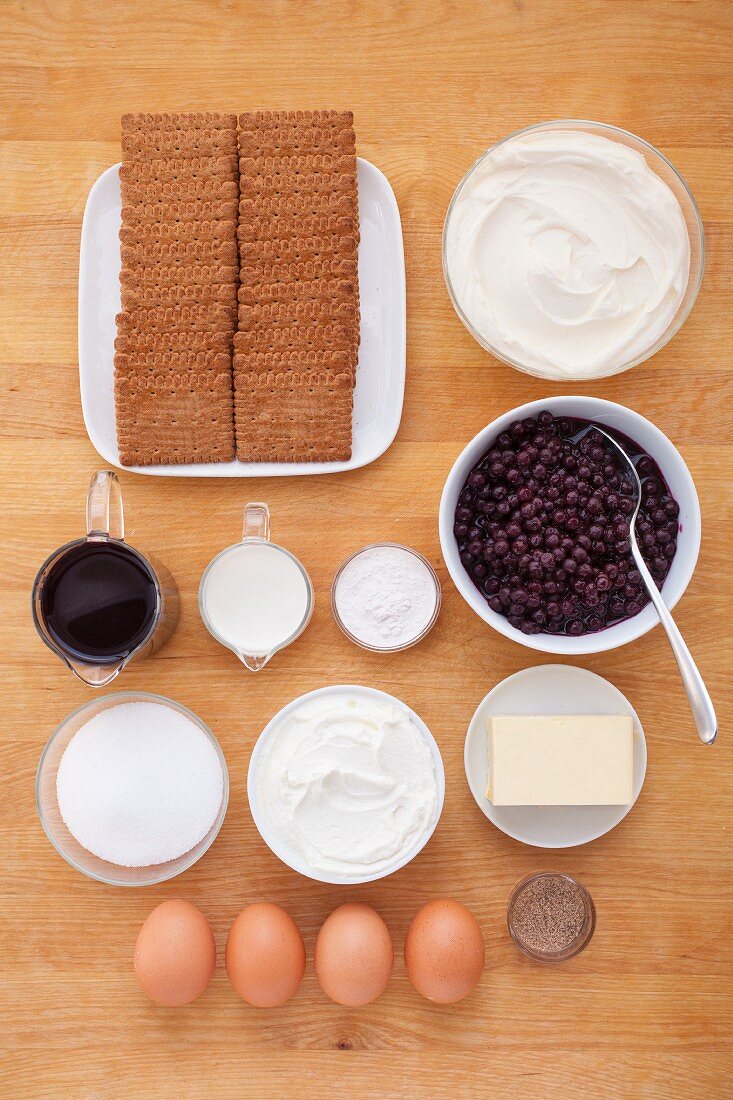 Ingredients for blueberry cheesecake with a biscuit base