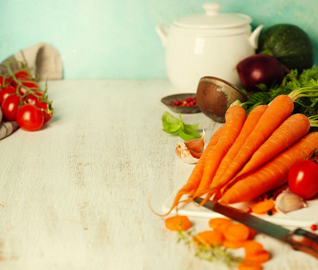 Fresh ingredients for cooking on wooden background