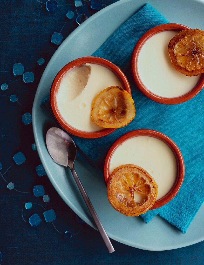 Lemon creme caramel in small bowls (top view)