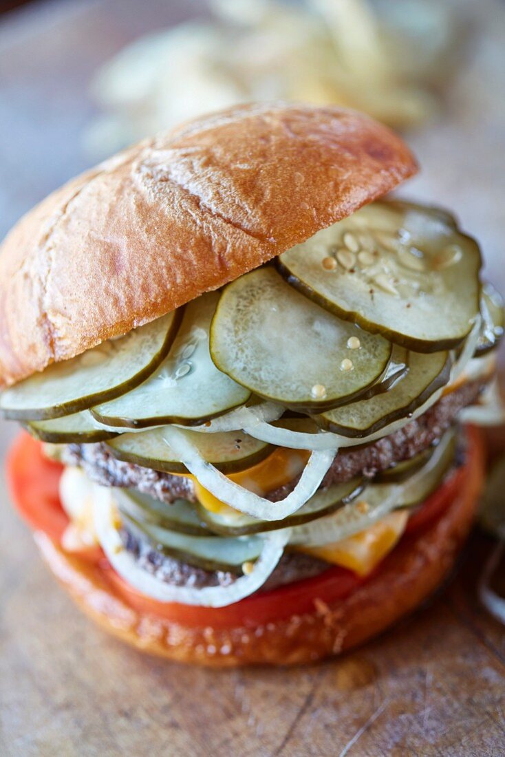 A burger with refrigerated pickles